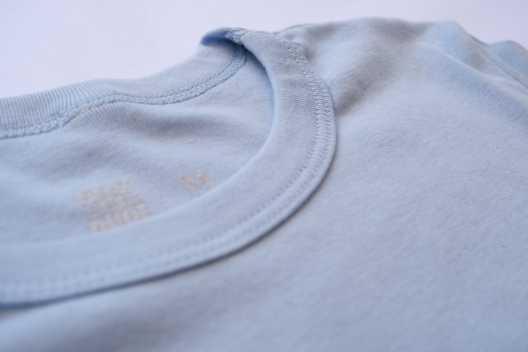 N.E.A.T. Baby Tee